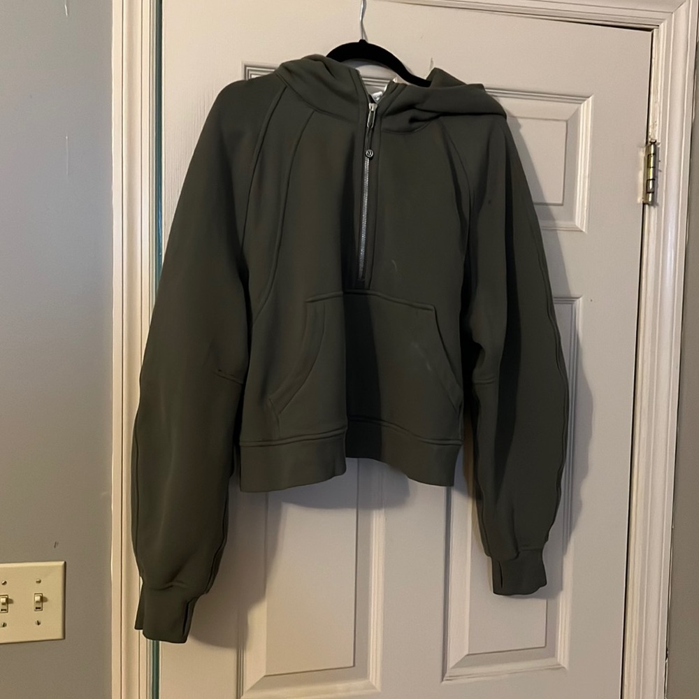 Lululemon scuba 1/2 zip. Has three stains on it that I cannot get out.